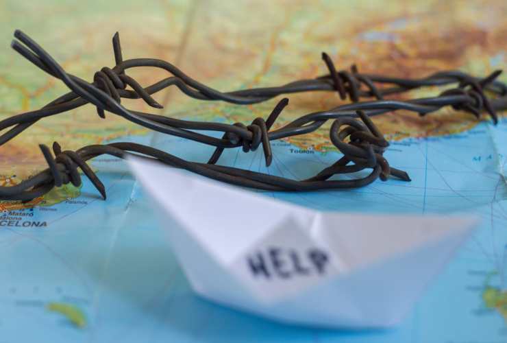 Migranti che giungono in Italia